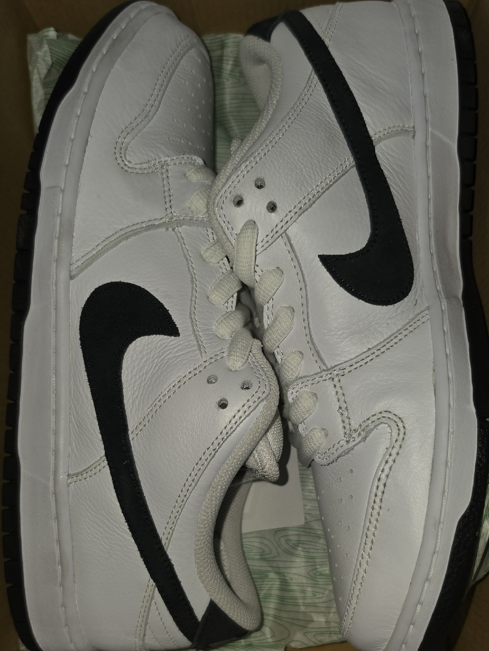 Nike White Sneakers with Black Swoosh